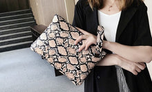 Load image into Gallery viewer, Snake Print Wristlet
